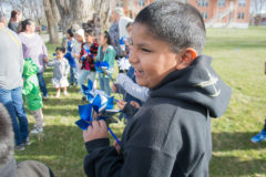 Niko Frost waits his turn to plant his blue pinwheel in the entrance of the Mouache Capote Building on Monday, April 15. Each pinwheel was planted by a Southern Ute Montessori Academy student to bring awareness for Child Abuse Prevention Month. 


