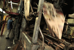 The Southern Ute Drum rolls off the Farmington Daily Times printing press in New Mexico, Feb. 12, 2009.