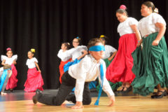 Ignacio Elementary fourth and fifth grade students of Ballet Folklorica perform “La Iguana,” a traditional song about farmers who were pestered by iguanas during their harvests. The dancers opened the “Rockin’ Rhythms” Elementary Spring Concert, Thursday, May 2 in the Ignacio High School Performing Arts Auditorium.