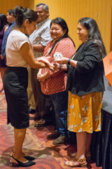 Southern Ute Chairman, Christine Sage presents Charise Hunter a custom piece of pottery at the annual Education Banquet on Friday, June 28 for completing her apprenticeship with the Education Department and Mentor, Lisa Pratchett. The 18th annual Recognition Ceremony and Education Banquet was held at the Sky Ute Casino Resort. 
