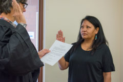 Southern Ute Tribal Court Judge, Scott Moore leads the swearing in of Andrea Quintana on Monday, June 10 in the TERO Conference Room. Quintana is the newest member of the Gaming Commission.