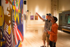 Moses Vogel points out a large-scale painting that is on display in the “Inside out” exhibit at the Southern Ute Museum to James “Austin” Stillwaugh. The two were on a trip sponsored by the 4-H club of La Plata County, and spent the day exploring the museum and bowling at the Sky Ute Casino on Tuesday, June 4. 
