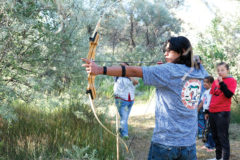 Staffon Olguin focuses on the target at the Tri-Ute Games Archery Course, where archery was held July 16 & 17.