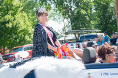 2018-2019 San Ignacio Fiesta Queen, Ylana Cloud throws candy out to parade participants during the 119th annual San Ignacio Parade on Saturday, July 27. 