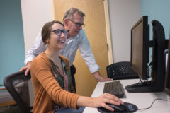 Distant Learning Programs Coordinator, Nicole Cabral and Adult Education Program Manager Dr. Jonathan Hunstiger, run a software program called “GED Academy,” in the new Adult Education Space, Wednesday, Sept. 4.