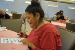 Benda Watts enjoys playing Ute Bingo at Sip, Chat and Chew held at the Multi-Purpose Facility on Friday, Sept. 20.