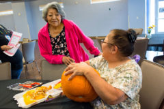 Evalyn Russell joins Ute elders and families at the monthly Sip, Chat and Chew luncheon at the Multi-Purpose Facility on Friday, Oct. 18.