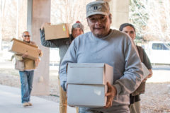 Hunters from the San Felipe Pueblo bring boxes of bread, cakes and pie to offer to the Southern Ute Tribal Council on Tuesday, Nov 19. in Council Chambers. The offerings serve as a thank you for giving them cultural hunting privileges. 