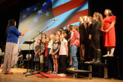 The Ignacio Elementary and Middle School choirs sang, “Freedom Song,” as the finale to the “A Salute to Our Veterans” performance; Holly Begay directed the choir.