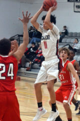 Ignacio guard Triston Thompson (11) attempts a mid-air pass against Ordway-based Crowley County at last season’s Limon Invitational.  The Bobcats will again begin play at the event, scheduled this year for Dec. 6-7.
