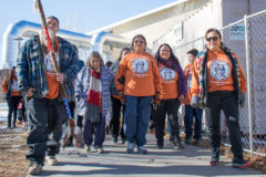 The Burch sisters: Leona, Lynette and Leora lead their mother Irene Burch and all Memorial Leonard C. Burch Walkers. The annual memorial walk was held at the SunUte Community Center on Tuesday, Dec. 10.