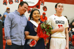 At halftime of the Ignacio High School boys’ Feb. 15 varsity basketball game versus Ouray, the school’s SnowComing 2020 Winter Royalty was announced and presented to all inside IHS Gymnasium. Senior Bird Red (23) was named King and, flanked at left by her uncle Tim Ryder, senior Helaina Taylor a beaming Queen.