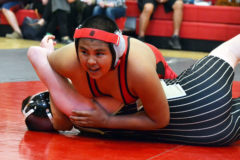 Ignacio Middle School wrestler Ambrose Valdez, competing at a listed 144 pounds, glances up in hopes of hearing the referee call a pin during his bout against Pagosa Springs’ Chance Hart during the Bobcats’ March 3 home triangular, which also welcomed Durango’s Miller Middle School.  Valdez’s stick became official 1:22 into the second of three 1:30-length periods, but the Pirates would best IMS by an unofficial 54-26 count after 15 total bouts. Following a trip to the 3/7 PSMS Invitational, the ’Cats were to host another tri on March 10 (results unavailable at press time), then attack the Cortez-hosted league championships on the 14th.