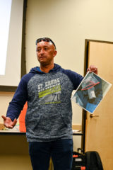 SUPD Detective Richard Herrera holds up a photo of drugs found on the Southern Ute Indian Reservation while discussing what he’s seen in the community and how everyone can be a part of combating drugs in the community. 
