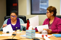 Southern Ute tribal elder Lynda D’Wolf passes out new materials to the Director of the Southern Ute Education Department, LaTitia Taylor and other participants of the Ute Language class, Friday, March 6. The class is held in the Chief Ignacio conference room each week; class is offered every Friday to tribal members, employees and community members to help them learn the Ute language.  