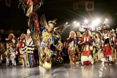 Head Dancers stand together for the Victory Song as the Gathering of Nations Powwow comes to a close in Albuquerque, N.M. The annual event was cancelled this year due to COVID-19, but will return to EXPO New Mexico in the spring of 2021. 
