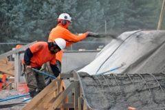 On Tuesday, Sept. 8, Artisan Skatepark workers use a process where they shoot concrete through a hose, called “shotcrete,” to reach the ramps and various skate features of the skate park, the concrete is then smoothed by hand