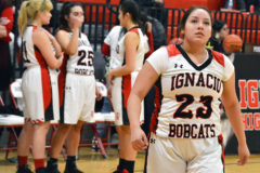 Ignacio’s Ebonee Gomez (23) puts on a proper game face prior to second-half play inside IHS Gymnasium during the 2019-20 season. Now a senior, as were Elizabeth Valdez, Bella Pena and Makayla Howell (all visible at rear) last winter, she’ll be one of the Lady Bobcats’ primary leaders ... if and when the COVID-shortened 2020-21 season tips off. The season was delayed for a second time as of Dec. 6.