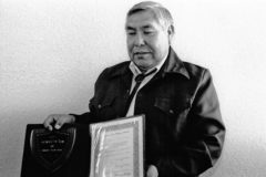 Southern Ute Chairman Leonard C. Burch holds the plaque and certificate he was awarded – the Durango Community Citizen Award in 1997. Burch also received the 15th Annual Martin Luther King Humanitarian Award (2000) and the Council of Energy Resource Tribes’ Achievement Award (2002).