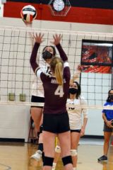 Ignacio sophomore Harmony Reynolds (12) leaps for a kill over Telluride’s Emma Righetti (4) during SJBL action Saturday, April 3, inside IHS Gymnasium. Reynolds played well in place of injured soph Trinity Strohl, lost to an ankle injury during the teams’ 3/27 clash inside THS’ MinerDome.