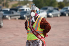 Shaandiin Parrish, Miss Navajo Nation, takes a brief pause while distributing food to Ganado community members. A political science graduate from Arizona State University, Parrish was selected as Miss Navajo Nation in September 2019. Since the COVID-19 pandemic began, she has been traveling across the Navajo Nation distributing food to Diné families. Parrish was selected because of her embodiment of the Navajo values imparted to her during her Kinaaldá, or coming-of-age ceremony, as well as for her academic accomplishments. She may continue holding the Miss Navajo Nation title into 2022 if the annual contest continues to be postponed because of the pandemic.