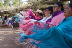  

Adorned with brightly colored shawls, women lined the Bear Dance corral in a circular fashion — dancing for an Honor Song in recognition of Father’s Day. 