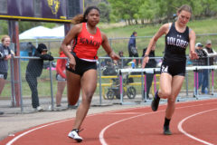 Ignacio’s Lexy Young (8) runs alongside Dolores’ Akira Edwards during Heat No. 4 of the girls’ 200-meter dash at the May 22, 2021, Pine River Invitational inside Bayfield’s Wolverine Country Stadium. Young would place seventh overall in 30.70 seconds; included in the same heat, Montezuma-Cortez's Avery Wright won the event in 28.44.