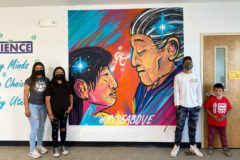 Elisia Cruz, Serifina Chakee, Cyrus Naranjo and Andre Bluestar-Baker proudly stand in front of the finished mural. An official unveiling will be held in Southern Ute Behavioral Health Building, Thursday, June 24 between noon - 2 p.m. 