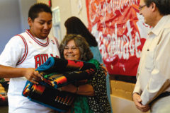 10 Years Ago: Southern Ute Chairman Pearl E. Casias presents Orion Watts, a 2011 Ignacio High School graduate, with a personalized Pendleton blanket during the Southern Ute Education Department’s Education Banquet on Friday, 24, at the Multi-Purpose Facility as Vice-chairman Mike Olguin looks on. Nearly 50 students were honored for academic achievements.
This photo was first published in the July 1, 2011, issue of The Southern Ute Drum.