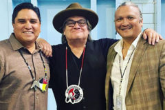 Ernest House Jr., Walt Pourier and Darius Lee Smith (left to right), stand together for a photo following the signing of Colorado Bill SB21-166, at the Denver Indian Center on Wednesday, June 28. The bill prohibits the use of American Indian mascots by public schools, including charter and institute charter schools, and public institutions of higher education effective – June 1, 2022.