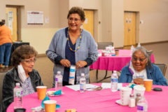 Ute Mountain Ute elders, Laverna Summa and Emily House listen as Southern Ute elder, Lynda Grove-D’Wolf explains the benefits of healing plants and alternative medicines. D’Wolf hosted the culture workshop for other Ute elders to attend on Thursday, August 19 at the Southern Ute Multi-Purpose Facility. 