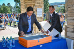 FLC Board of Trustee Member and Ute and Ute Mountain Ute tribal member, Ernest House Jr. and FLC Special Advisory to the President for Indigenous Affairs, Lee Bitsoi, place the removed panels into proper storage containers that will be relocated to the Center of Southwest Studies. 