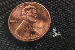 The amount of white substance shown next to a penny is a lethal dose of fentanyl, according to federal agents at the U.S. Attorney’s Office.