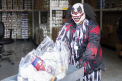 Southern Ute Food Distribution Stock Clerk, Bradlin Goodtracks pushes a cart of CARES Act Food Packages to load into a vehicle on Thursday, Oct. 14. The food program staff got into the Halloween spirit by dressing up this year to deliver food.  

 