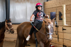 Southern Ute tribal member Nevaeh Sandoval, daughter of Skydawn Burch, rides a horse named Bernard. Each horse in the program has its own individual personality and characteristics. Young participants are encouraged to not only bond with their horse, but also strengthen their communication skills as they learn from the Horse Empower program.