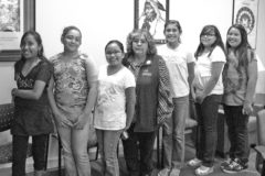 10 Years Ago: Members of the Southern Ute Education Department’s Girls in Action program visit with Chairman Pearl E. Casias in the Chief Ignacio Room of the Leonard C. Burch Tribal Administration Building during a lunch meeting in which the girls asked questions and Casias shared stories from her childhood. Pictured (left to right) are Destinee Agulair, Chasity Bean, Samara Peabody, Casias, Serena Fournier, Alyssiana Baker and Reyna Garcia.
This photo was first published in the Oct. 7, 2011, issue of The Southern Ute Drum.