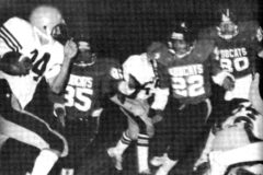 40 Years Ago: Three Bobcats put the rush on Drew Teinert, Pagosa Springs’ Pirate. The Ignacio Players are: Buffy Joseph (85), Adrian Lucero (80) and Mike Duran (22) Ignacio lost the game 33-0 to Pagosa. 
This photo was published in the Oct. 23, 1981, issue of The Southern Ute Drum.