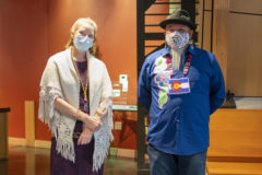 Southern Ute Cultural Center and Museum Director, Susan Cimburek and Inside Out 2.0 featured artist, Edward Box III stand together at the entrance of the exhibit entrance to welcome and greet guests on Friday, Oct. 8.  