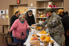 Southern Ute tribal elder Denise Thompson gets a plate of food from Events and Heritage Coordinator, Jack Frost III on Friday, Oct. 1 at the Multi-Purpose Facility’s Gathering Room. The Ute Speaker Brunch created a social space for Ute elders to talk in their traditional language and converse with other members of the community over a meal.  

 