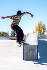 Sunshine Cloud Smith Youth Advisory Councilmember, Nate Hendren does a 50-50 Grind down a concrete slide during the Grand Opening Event of the PÍINU NÚUCHI Skate Park on Friday, Oct. 29.  