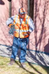 Southern Ute tribal member, Deichman Dean Hudson, Jr., helps string Christmas lights on the tops of trees ahead of the holiday season on Tuesday, Nov. 23. The Grounds Maintenance crew has decorated multiple buildings on tribal campus. 
