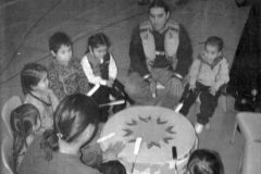 Many Moons 20: Pictured are one of two drum groups from the Southern Ute Academy who delight the audience with its performance during the Tribal Christmas Program on Dec. 14, 2001 in the SunUte Community Center gymnasium. All drum groups were under the direction of academy counselor John Oberly.     