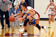 Ignacio’s Avaleena Nanaeto steals the basketball from Dove Creek’s Rylee Hickman during action Thursday evening, Jan. 6, inside IHS Gymnasium.