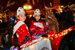 Members of the Southern Ute Royalty greet spectators along Main Street in Durango, Colo. during this year’s annual Snowdown light parade, Friday, Feb. 3 2012. Little Miss Southern Ute Eufemia Pardo (left), and Little Miss first alternate Yllana Howe (right) bundle up against the cold on their float titled: “Once upon a time ... how the Nuche ‘Utes’ came to be.” This year’s Snowdown theme was “Once upon a Snowdown” referencing fairy tales. 