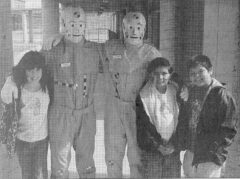 20 Years Ago: As part of the Kids Fair held at the Rolling Thunder Hall on February 14, 2002, Vince and Larry (the crash test dummies) took a break from the events and strolled over to the Southern Ute Indian Montessori Academy to pay a visit to the students. Jessica Ross, Suzi Richards and Kelsey Frost are seen posing here with Vince and Larry. This photo was first published in the February 22, 2002 issue of the Southern Ute Drum. 