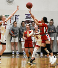 Ignacio's Avaleena Nanaeto (35) tries a three-pointer over Peyton's Emme Ratliff (4) during the 2A-Region VIII semifinals Fri., March 4, at PHS. IHS managed to hit just two of 14 attempts (PHS went 5-of-14) from downtown in a 47-38 loss. 