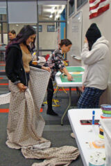 Ignacio High School students in Ms. Leash’s class working on ribbon skirts and shirts.