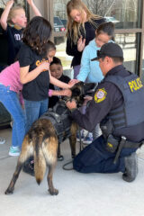 Southern Ute Police Dept. Officer, Adrian Wauneka and Police K-9, Raven, stop by the Boys and Girls Club of the Southern Ute Indian Tribe’s Spring Break “All Day” Club on Friday, March 25. Wauneka gave an impromptu lesson about the work that they do for the community, while providing an opportunity for the kids to meet Raven for the first time. 