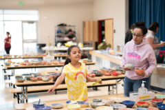 Angela Richards and daughter Aaliyah Richards select ceramic clay bowls created by students at Ignacio Elementary School as part of the Empty Bowls Project which took place Thursday, April 28 in the Ignacio Elementary School Cafeteria. The Empty Bowls Project is an international project aimed at raising awareness to local and global hunger, this movement supports food-related charitable organizations around the world and has raised millions of dollars to help end hunger.  