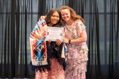 Academic Advisor and Assistant Principal, Rachel Colsman presents Durango High School graduate Tanneigha Rock-Garcia with a congratulatory certificate on Saturday, May 21, at the Fort Lewis College Ballroom. Prior to graduation, the Native American Parental Advisory Committee welcomed Native students and their families to celebrate student’s academic achievements and give well wishes as each student transitions into young adulthood.  
